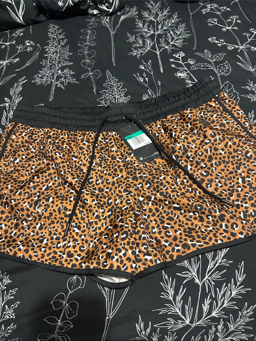Nike Leopard-Print Athletic Shorts in Brown and Black